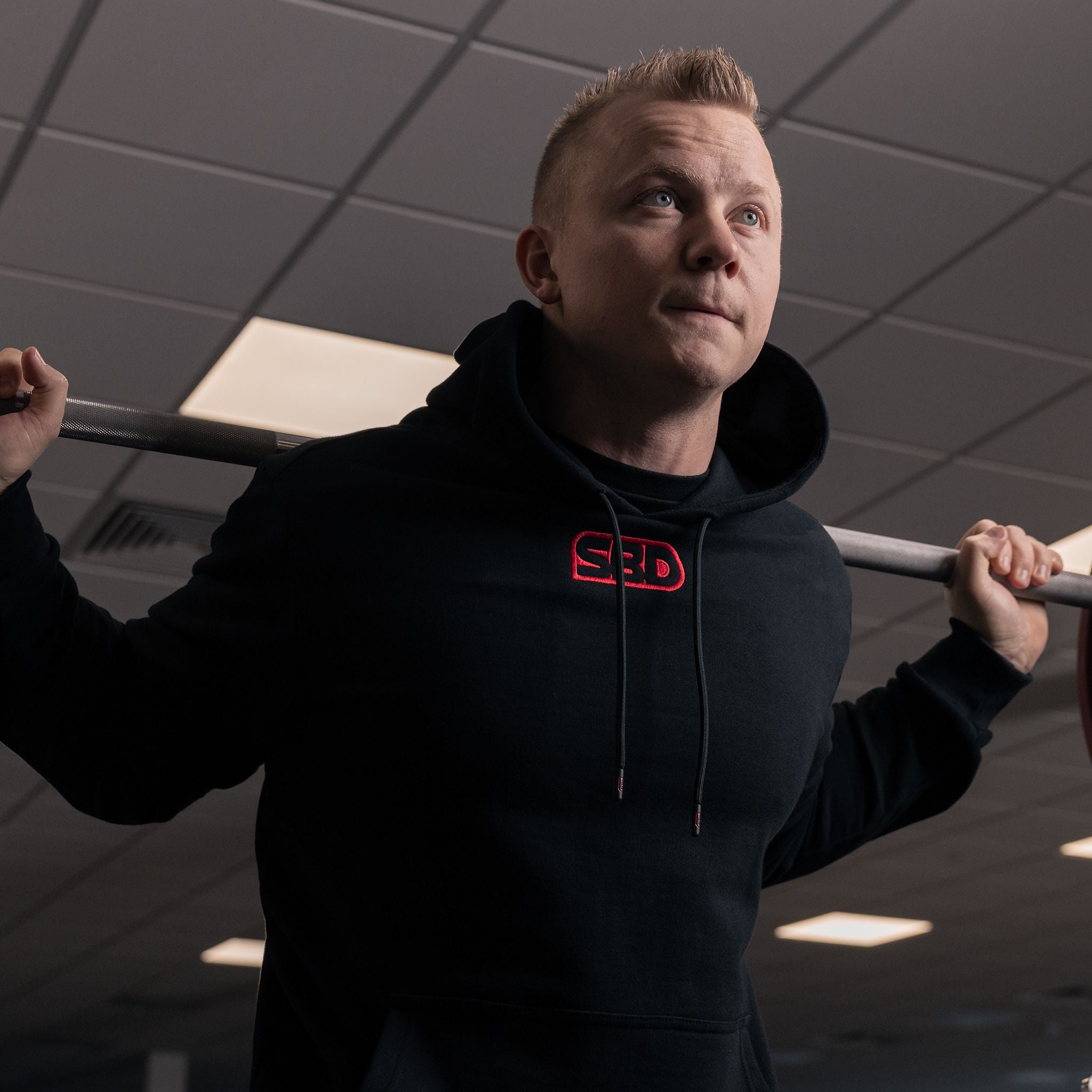 Man wearing SBD Hoodie (Unisex)